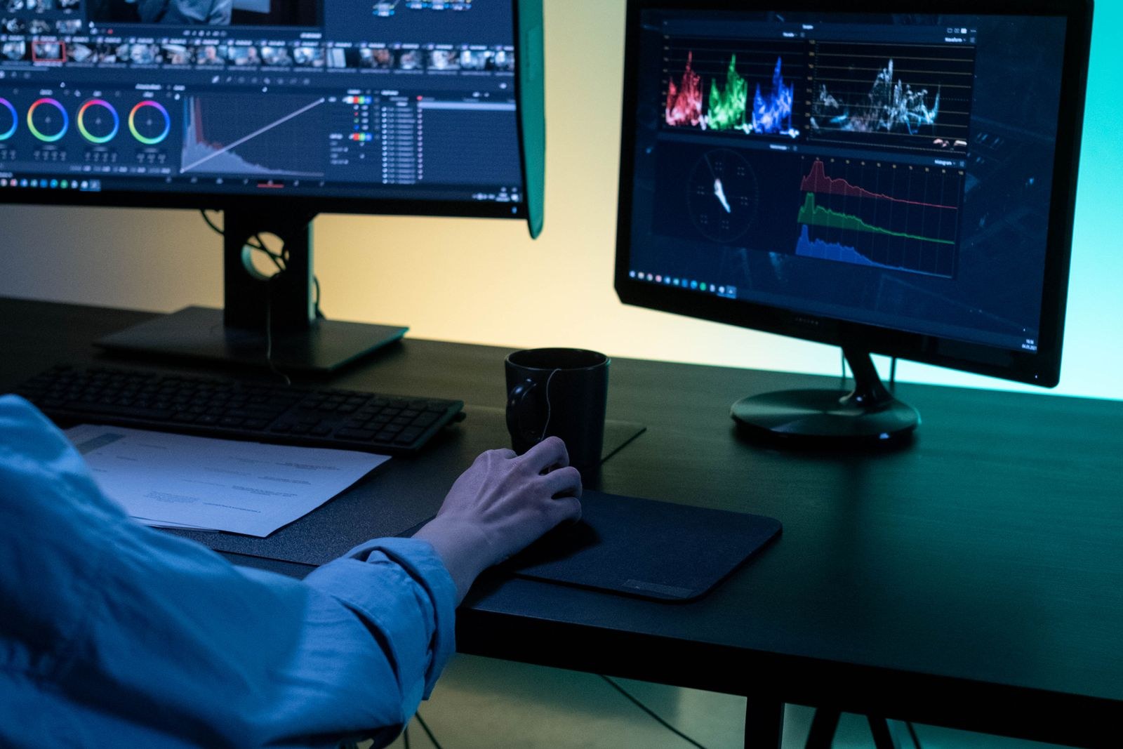 Editor at a workstation reviewing a timeline